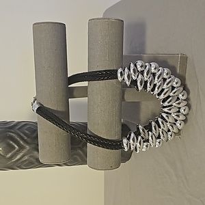 Black rope and silver necklace